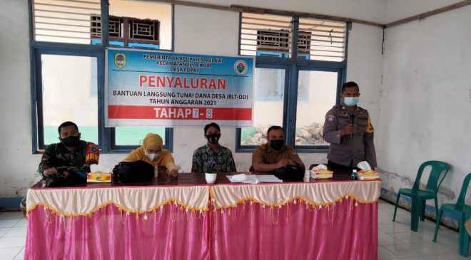 Penyaluran BLT-DD Popai Dihadiri Bhabinkamtibmas Bripka Maskur