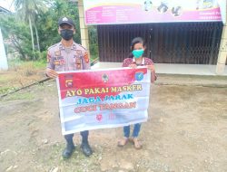 Gunakan Banner Polsek Sokan Ajak Warga Patuhi Prokes